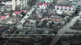 Ukraine War  Cyclist appears to be shot by Russian armoured vehicles in Bucha