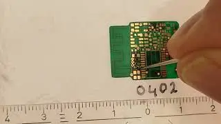 Aligning SMD 0402 parts with a sewing needle
