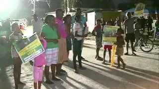 APNU-AFC uses children to disrupt PPP/C public meeting – Bottles hurled, PPP flag burnt