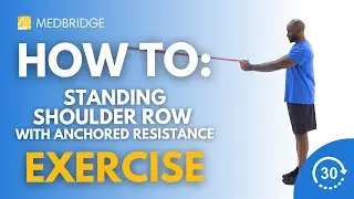 How to Do a Standing Shoulder Row with Anchored Resistance | MedBridge