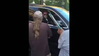 John Mellencamp signing autographs