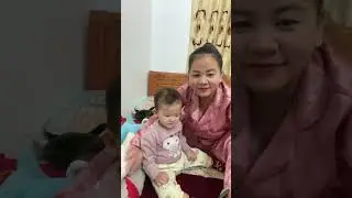 BREASTFEEDING BABY BY BEAUTIFUL MOTHER.