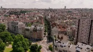 Birds eye perspective of Brussels, Belgium. Buildings with red roofs stretch into the distance