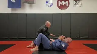 Escape Side Control Using the Reverse Armbar