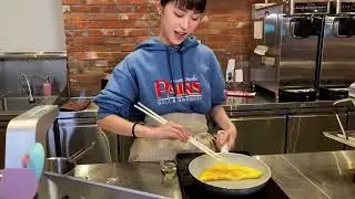 Ryujin’s cheeky smile after flipping the egg