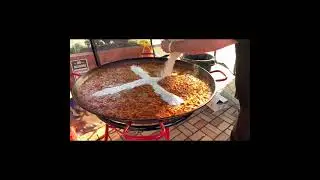 Making a very very big Paella-chicken-chorizo-hot link