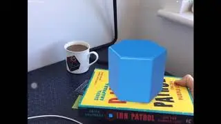 The Code Hub: Augmented Reality at Home, Using Reality Composer to Anchor a Scene to a Book Cover