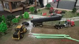Building a Pipe Line Display at the 2024 St. Louis Farm Toy Show