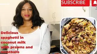 Delicious spaghetti in coconut milk with prawns and meatballs