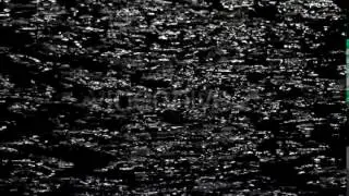 Black and White Sparkling Waves Moving Aggressively at Night in Autumn.
