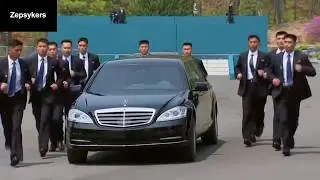 I put spongebob music over north koreans bodyguards escorting Kim Jung-un