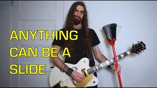 Slide guitar with 23 random objects in 48 seconds