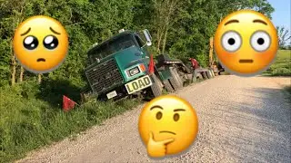 Placing rip rap in  a ditch and got the truck stuck