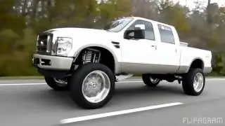 Precision cut lifted trucks low cars rolling to the show