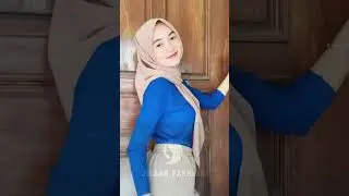 Jilbab Pink Dengan kaos Biru 
