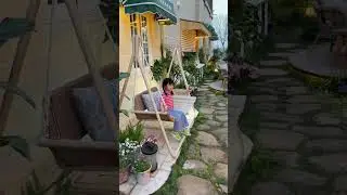 Imagine seating on a ratten swing to enjoy the summer oasis!