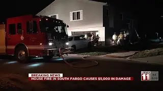 Overnight fire burns hole in the side of a South Fargo home