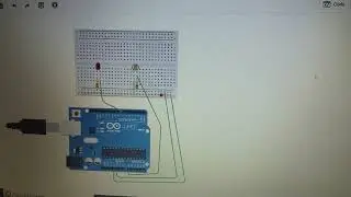 DEMONSTRATION OF THE CIRCUIT WHICH GLOWS LED BASED ON THE LEVEL OF BRIGHTNESS IN TINKERCAD.
