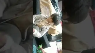A sibling is pretending to be a doctor and checking on another child