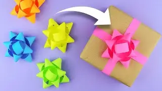 Сделала красивый бант для украшения подарочной коробки из бумаги