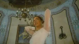 mixkit a redhead woman is dancing and modeling in a victorian 41521