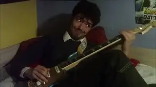Music from a guitar on vintage video