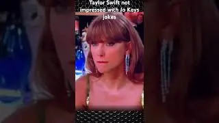 Taylor Swift not laughing at Jo Koys Golden Globes routine. 