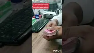 Tutorial memasukan Uang kedalam sabuk kertas.