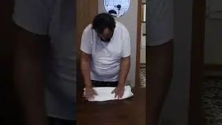 Folding a fitted Sheet