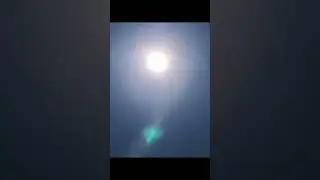 I GOT SOME GOOD SHOTS OF THE SUN WITH ORBS NEXT TO IT.