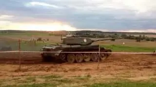 A tank battle reenactment that ends with a tank crushing a car. - WarGaming Minsk 2013