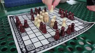 Playing Hnefatafl with Dog and Thimble