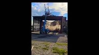 Forklift knocking down wall