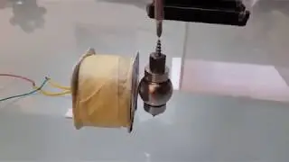 Simple electric magnet motor using neodymium sphere solar powered. Low energy input