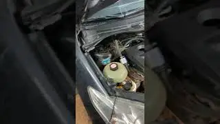 Как откручивать натяжной ролик Mazda 5