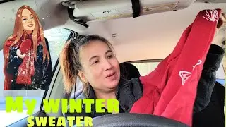 Unboxing winter sweaters for Christmas.