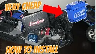 How to make a single servo conversion on a Traxxas a Revo/the cheap way!!!!!