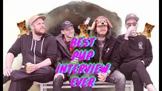 Pup Does Wacky Interview In Front of an Adorable Puppy