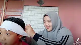 SIMULASI MEMBALUT LUKA DI KEPALA DAN CEDERA 