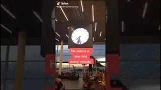 Man in Clock at Amsterdam Airport