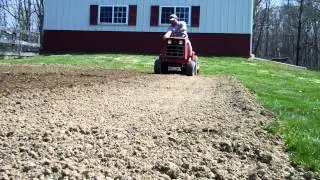 Tilling a garden with cub cadet 582  with model 1 tiller.