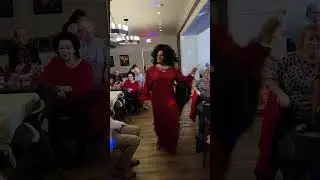 Alexis Flame  giving a twirl during Queens with Hearts at Tavern 61 on 2/11/24