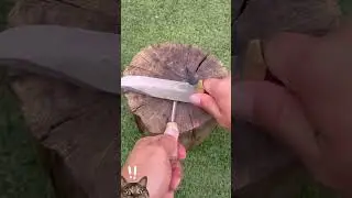 Creating Fire Sparks Using a Striker for Survival. 