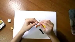 Рыжий кот из пластилина.