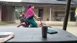 mom and daughter are riding cycle