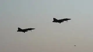 Two Saab JAS 39 Gripens take off side by side