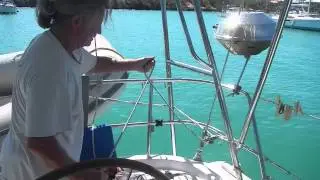 Operating Monet II - Dropping the Dinghy from the davitts