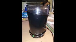 Krups F203 coffee grinder not working due to sugar and water contamination. Repair with a hammer.