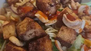 Spicy tofu, with dry roasted cashews, stir fried veg and noodles