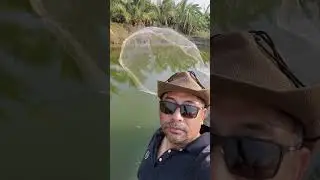 Casting fishnet at the pond